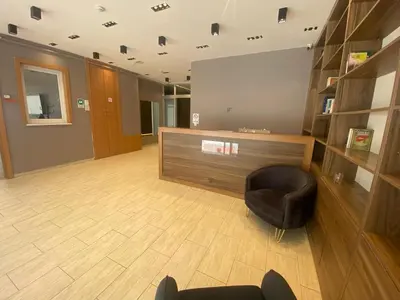 a waiting room with a chair and a screen at Tuyap Vip inn Hotels in Istanbul