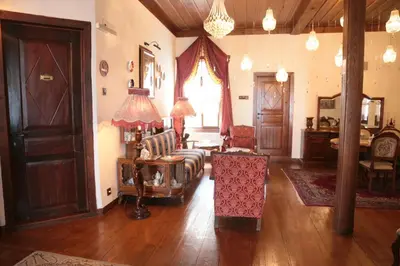 a living room with a couch and a chair at Aslibey Konaği - Adults Only in Sapanca