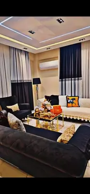 a living room with a couch and a table at Luxury Villa with Private Pool Garden Lake View in Sapanca in Sapanca