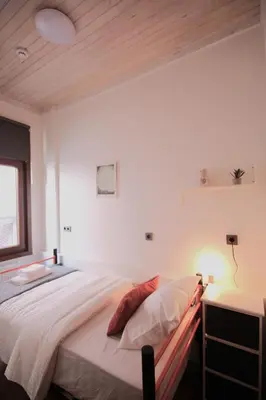 a bedroom with a large bed and a window at Private House Istanbul City in Istanbul