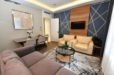 a living room with a couch and a table at Taksim Flat Apartment in Istanbul