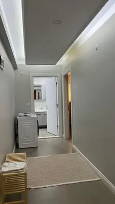 a living room with a kitchen and a room with a ceiling at 4 Mevsim Konak in Kartepe