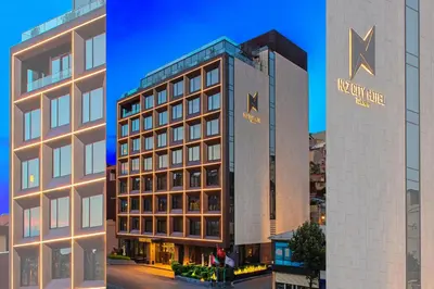 a hotel with a sign on the side of a building at Naz City Hotel Taksim - Special Category in Istanbul