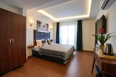 a hotel room with a bed and a television at Violin Hotel Sultanahmet in Istanbul