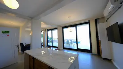 an office with a large island in a room with windows at 4 Mevsim Konak in Kartepe
