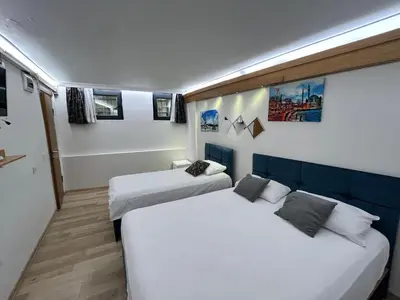 a room with two beds in a room with at Viva Sirkeci Butik Hotel in Istanbul