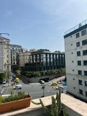 a view of a city street with cars and buildings at K&Y Taksim Rooftop in Istanbul