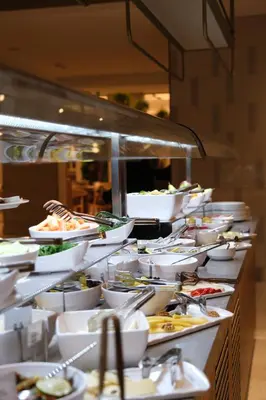 a buffet line with plates and bowls of food at Sia Hotel Thermal & Spa in Nilüfer