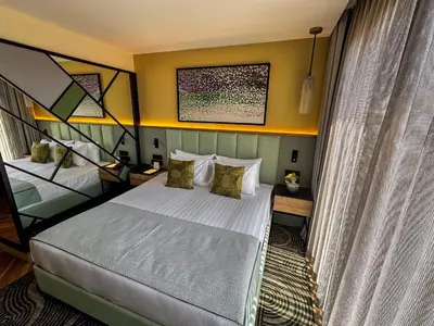 a bedroom with a bed in a room at The Wings Hotels Pera in Istanbul