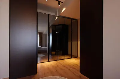 a room with black walls and a mirror at Andalus Villas Lake View NO ALCOHOL ALLOWED with Heated Pool in Sakarya