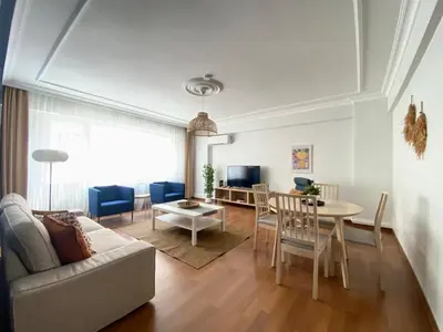 a living room with a couch and a table at City Center 3 Bedroom Flat - No4 in Istanbul