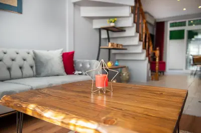 a coffee table in a living room with a couch at Bright Apart Hotel in Istanbul