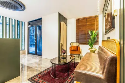 a living room with a couch and a table at Sistina Old City Hotel in Istanbul