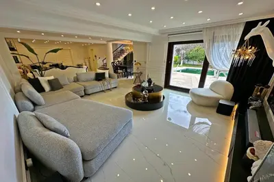 a large living room with a bed and a couch at Cloud Nine by Alara - Luxury Private Pool and Garden Villa in Beylikduzu