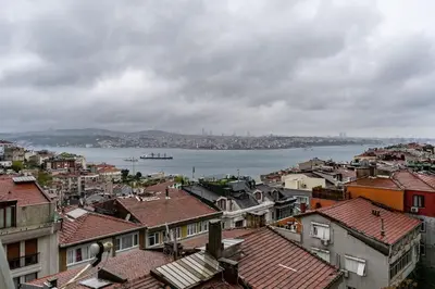 a view of a city with buildings and the water at Elegant 2BR Haven with Magnificent Bosphorus View in Istanbul