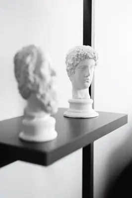 a statue of a head sitting on a shelf at Elegant 2BR Haven with Magnificent Bosphorus View in Istanbul