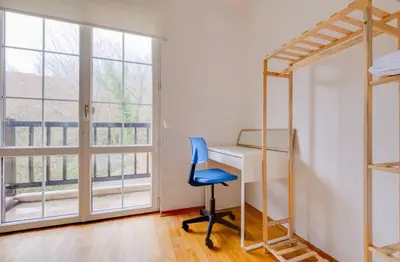 a desk and a chair in a room with a window at Villa Sapanca in Sapanca