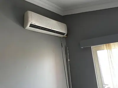 a room with a air conditioner on the wall at Butik Apart in Tekirdag