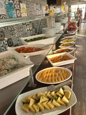 a buffet line with many different plates of food at Yağcı Hotel Erdek in Erdek