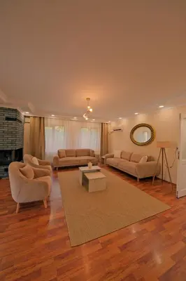 a large living room with two couches and a table at Kiwii Sapanca in Sapanca
