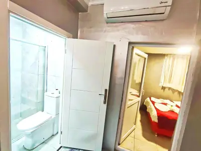 a small bathroom with a toilet and a sink at Taksim Luxury Capital Hotel in Istanbul