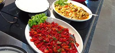 three bowls of food on a counter top at Sare Hotel in Erdek