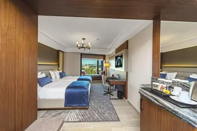 a hotel room with a bed and a desk at Arts Hotel Harbiye - Special Class in Istanbul