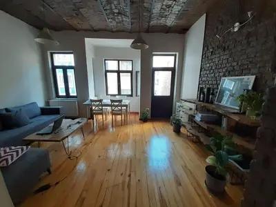 a living room with a couch and a table at Feridiye 3 Oda 1 salon Daire in Istanbul