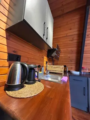 a kitchen with a sink and a counter top at Gölköy Bungalov Kandıra in Kandıra