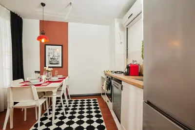 a kitchen with a table and a dining room at Private House near Taksim in Istanbul