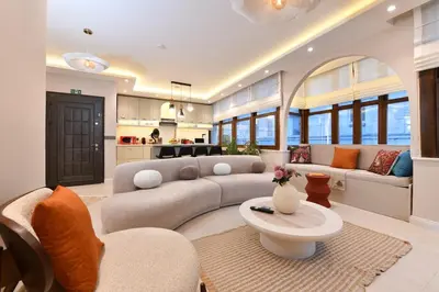 a living room with a couch and a table at chic ve modern daire taksim meydani in Istanbul