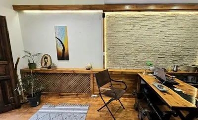 an office with a desk and a chair in a room at MAHZEN Otel in Istanbul