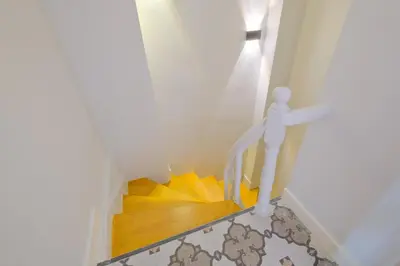a toy man walking down a stairs in a house at Casa Nozze in Istanbul