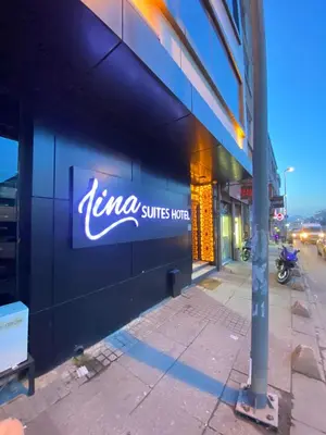 a sign on the side of a building at Lina Suit Hotel in Istanbul