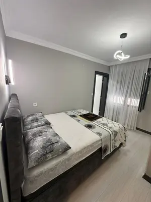 a bedroom with a bed and a couch at Lux Villa Silivri Kavakli in Silivri