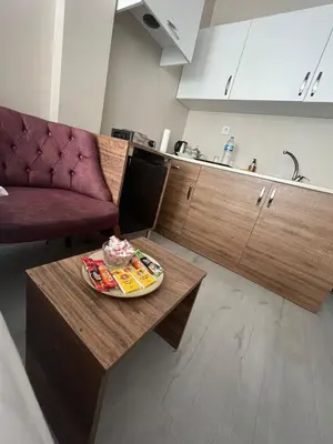 a plate of food on a coffee table in a kitchen at Massa Home TAKSİM in Istanbul
