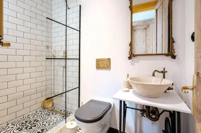 a bathroom with a sink and a toilet at Cozy Flat with Balcony Near Istiklal Avenue in Istanbul