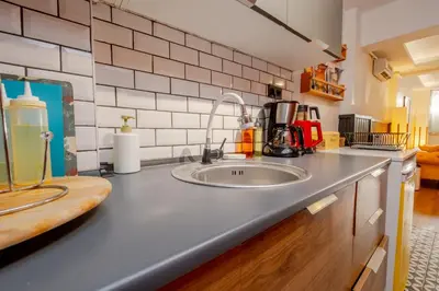 a kitchen counter with a sink in a kitchen at Cosy Apartment in Beyoglu in Istanbul