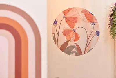 a painting of flowers on a wall with a rainbow at Cute Flat Vintage Design AC Galata in Istanbul