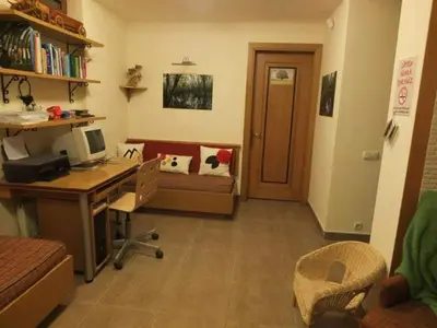 an office with a desk and a computer in a room at Meşeliev Pansiyon in Demirköy