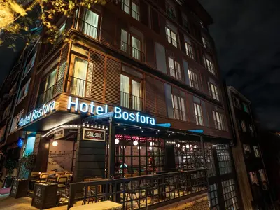 a hotel boston is lit up at night at Hotel Bosfora in Istanbul
