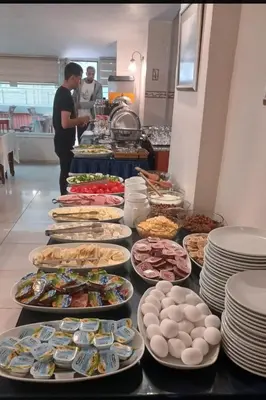 a buffet line with many different types of food at Hotel Çağyiğit in Istanbul