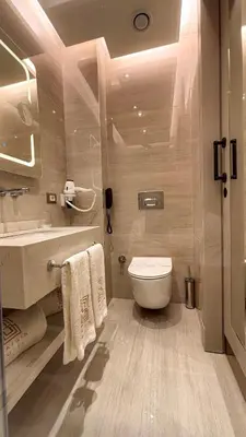 a bathroom with a toilet and a sink at Saygın Hotel Beşiktaş in Istanbul