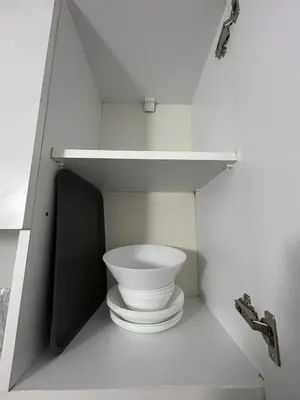 a bathroom with a white toilet on a shelf at i1 House Hotel with Lovely Seaview Terrace in Istanbul