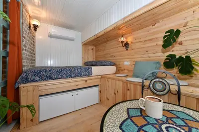 a cabin with a bed and a table in a room at Turkish Hammam 3 BR Historical Flat 3 AC in Istanbul