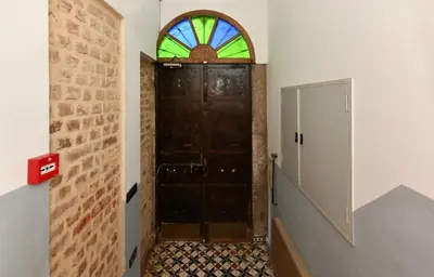 a door with a stained glass window in a hallway at Wooden Style AC Galata in Istanbul