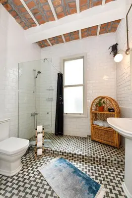 a bathroom with a toilet and a shower and a sink at 2BR Unique Terrace 2 AC in Beyoğlu Galata in Istanbul