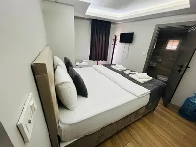 a bedroom with a large bed in a room at Mesil Hotel in Istanbul