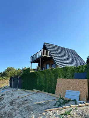a house on top of a green hedge at Karahan bungalov in Tayakadın
