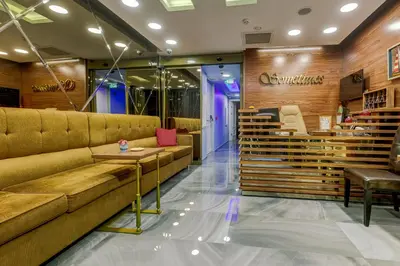 a store lobby with a couch and a table at Sometimes Hotel Taksim in Istanbul